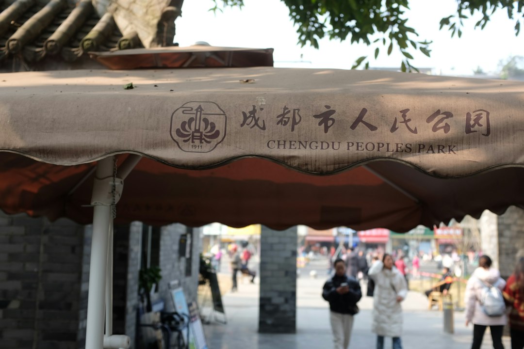 Chengdu people's park entrance canopy with people in background