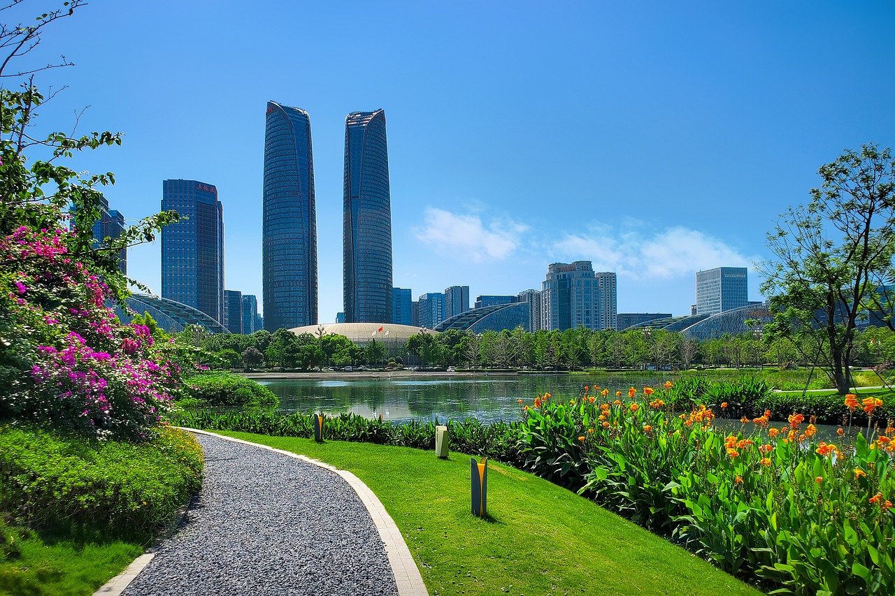 park buildings skyscraper nature flowers grass lake road flower background flower wallpaper city landscape beautiful flowers natural chengdu