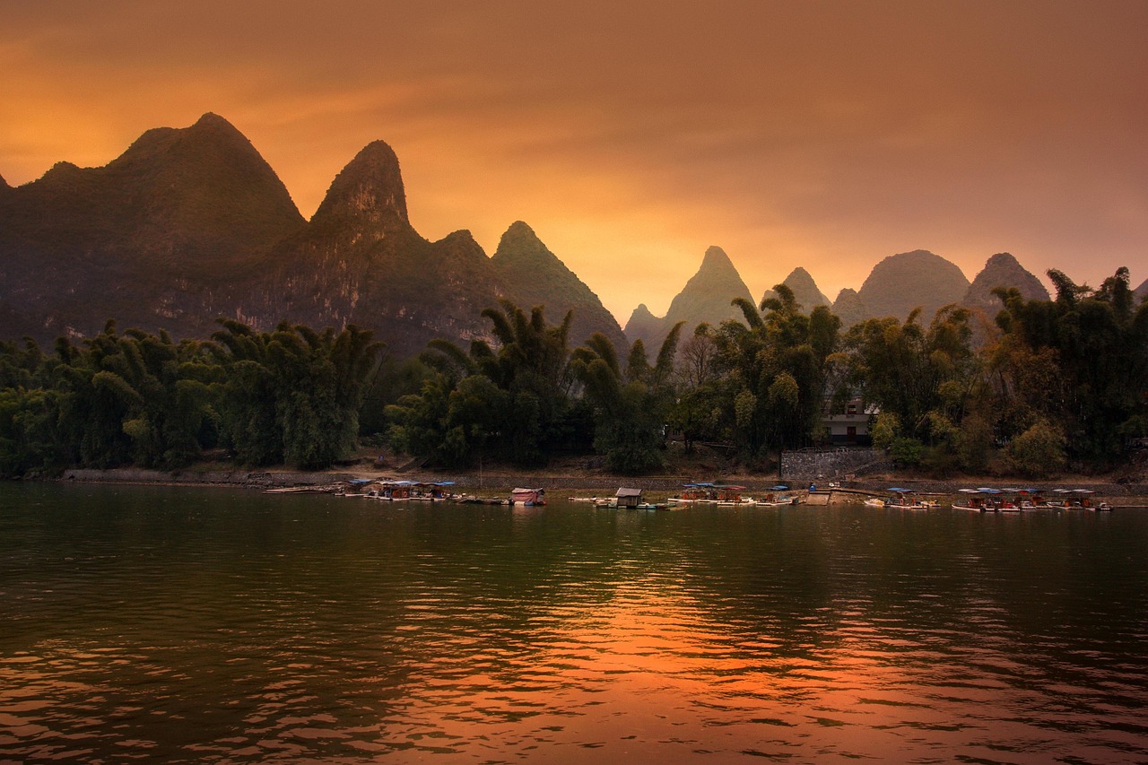 guilin  lake  hill  sunset  sunrise  dusk  mountain range  karst hills  landscape  scenery  attractions  nature  people's republic of china  asia  guilin  guili