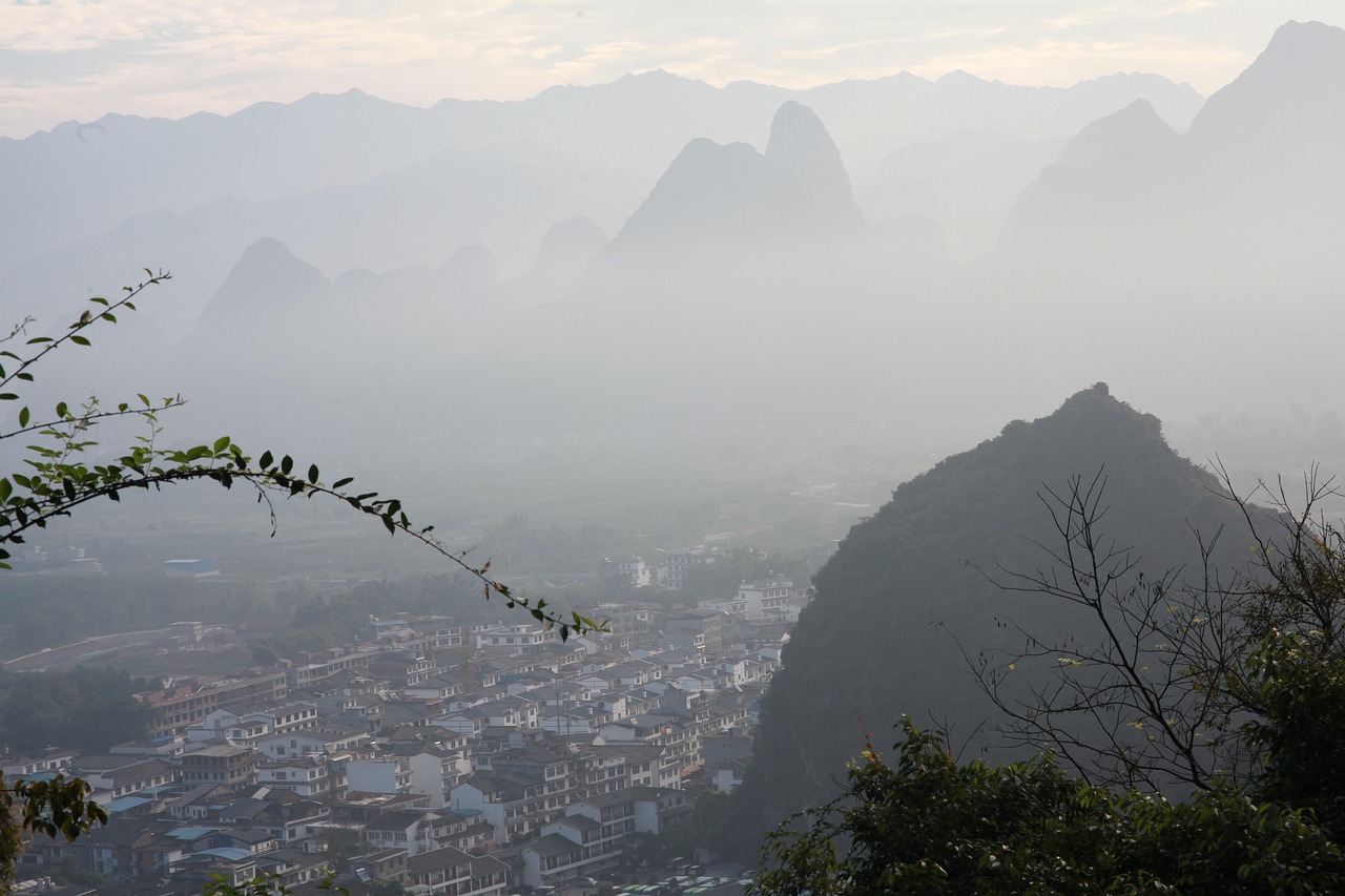 old street xingping ancient town view city nature mountain fog