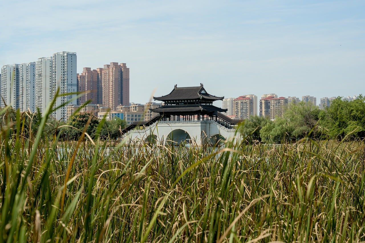 asia china xiangtan landscape scenic horizon city urban building architecture cityscape outdoors park nature garden bridge lake grass leaves