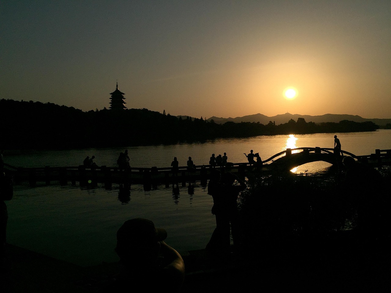west lake  nature  sunset  small bridge and flowing water  China  Hangzhou  Zhejiang