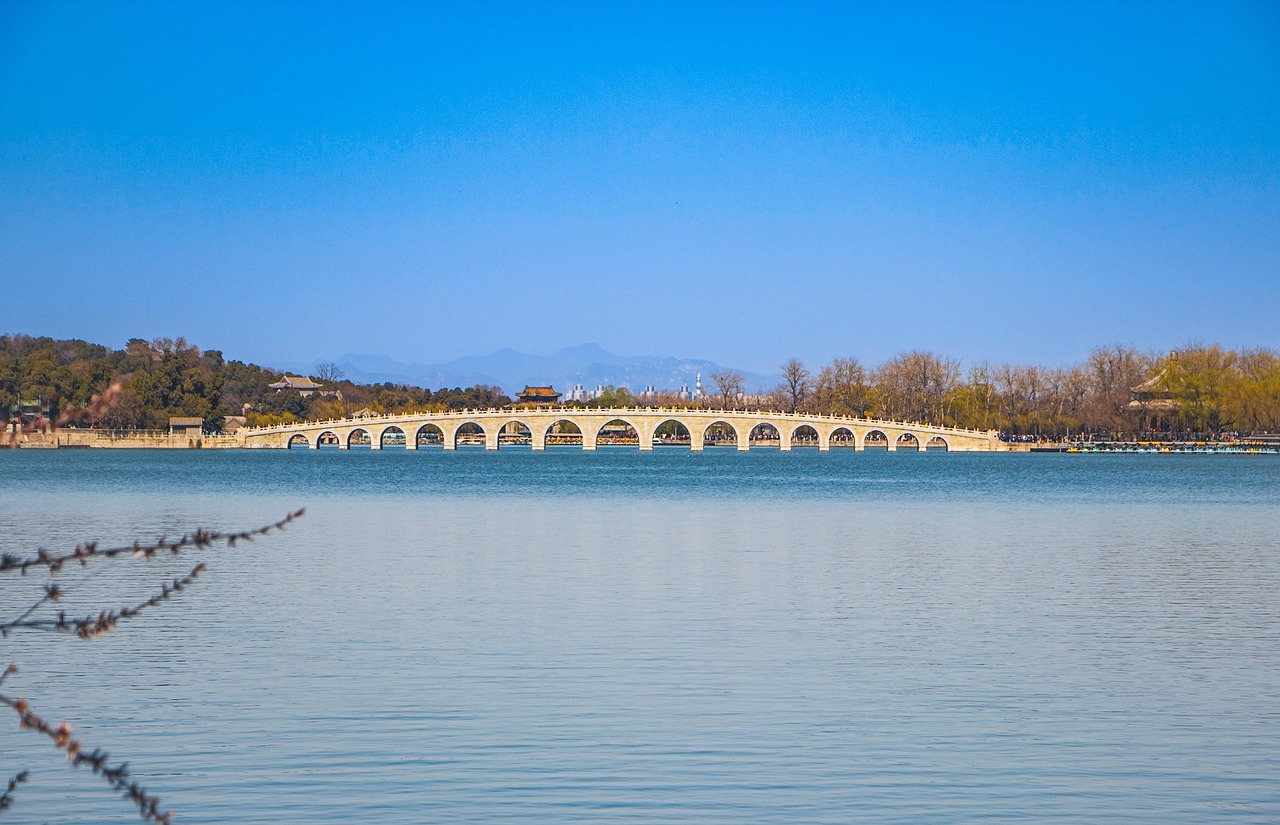 seventeen arch bridge  kunming lake  hill  lake  landmark  tourist attraction  scene  summer palace  beijing  china  sky  bridge  temple  mountain