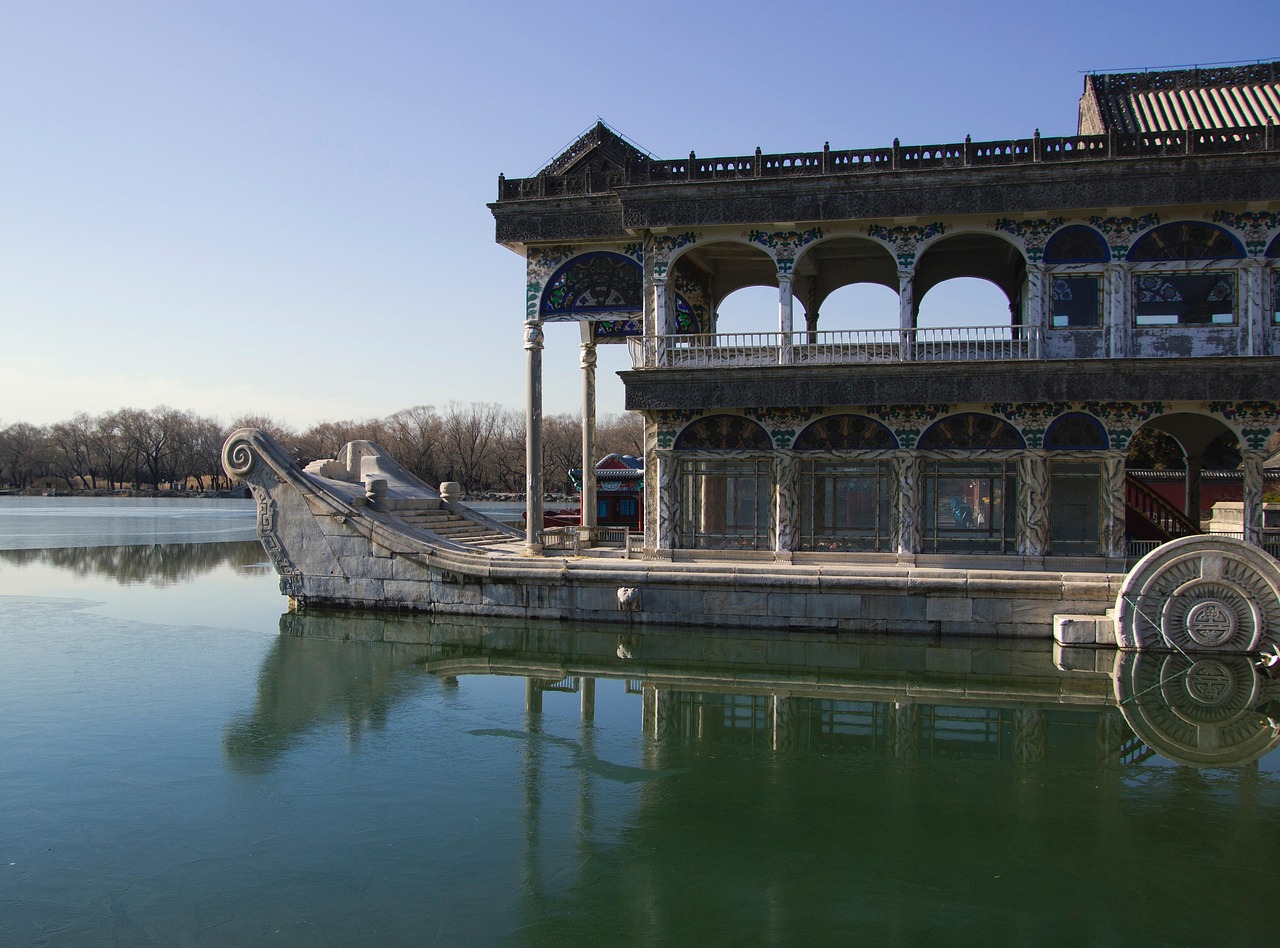 ferry lake port boats harbor landmark tourist attraction scene kunming lake summer palace beijing china stone boat marble boat