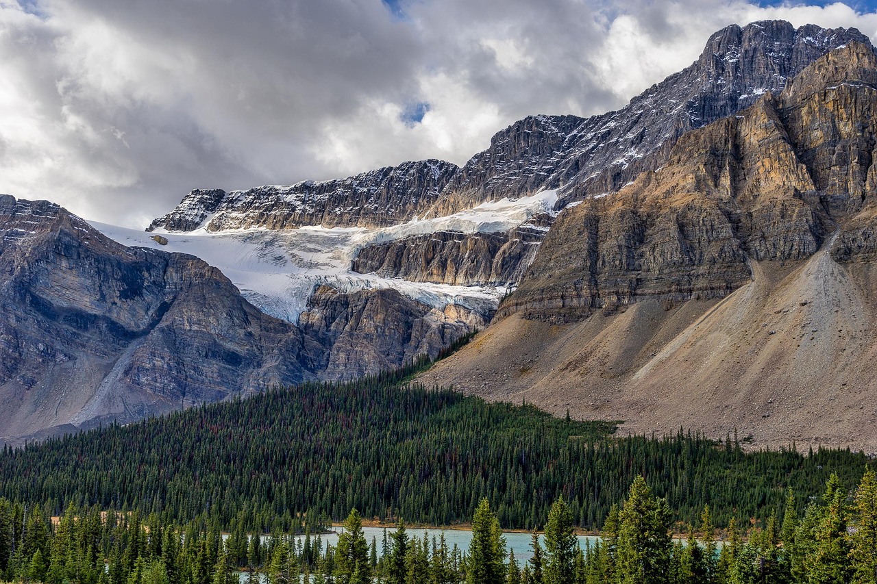 mountains snow trees glacier forest woods summit peak clouds landscape rocky mountains mountain range scenery scenic nature alberta west west c