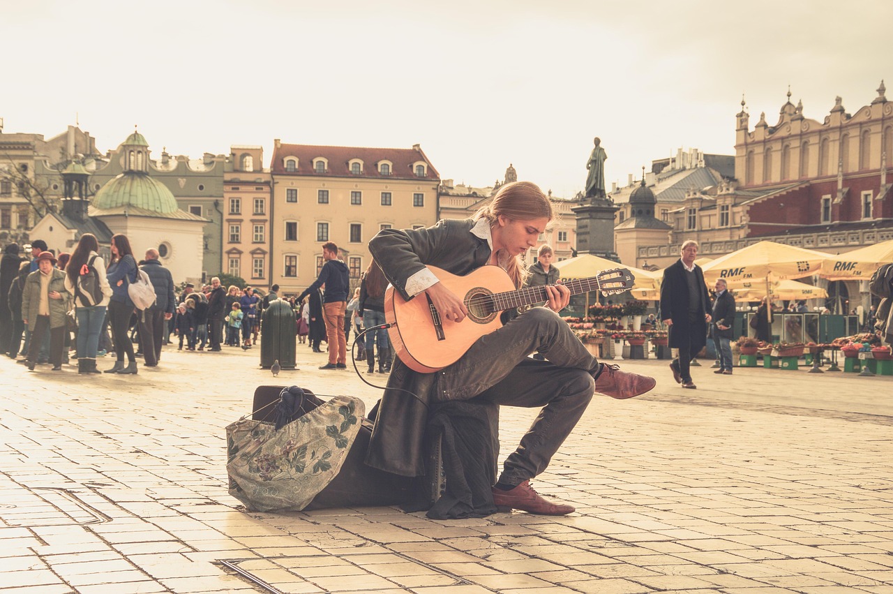 musician  guitarist  streets  people  music  string instrument  street artist  street performer  guitar  poland  square  old town  acoustic guitar  musician  mu