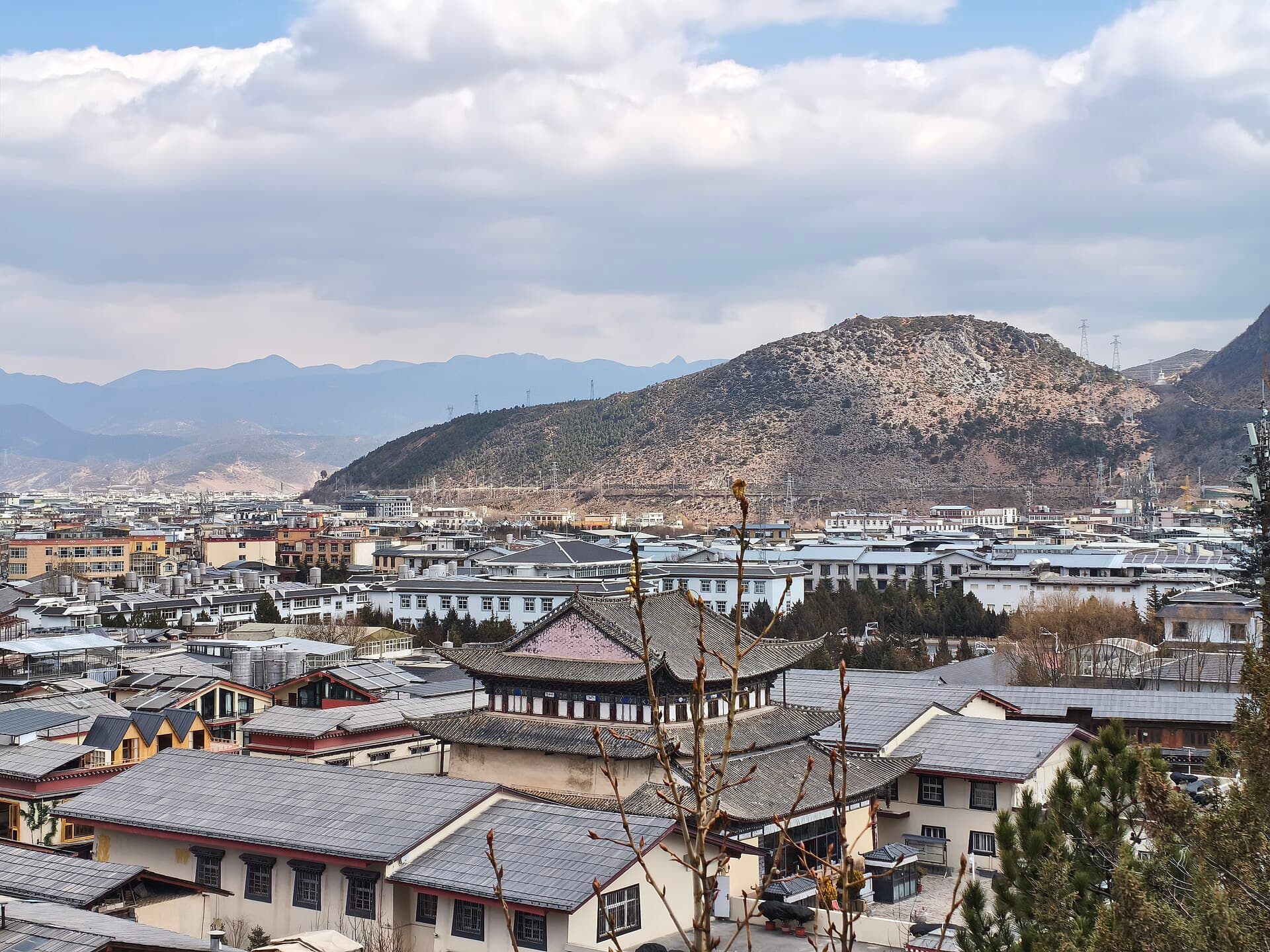 A view overlooking Dukezong Ancient Town and the skyline of Shangri-La from Guishan Park, Jiantang Town, Diqing, Yunnan, China