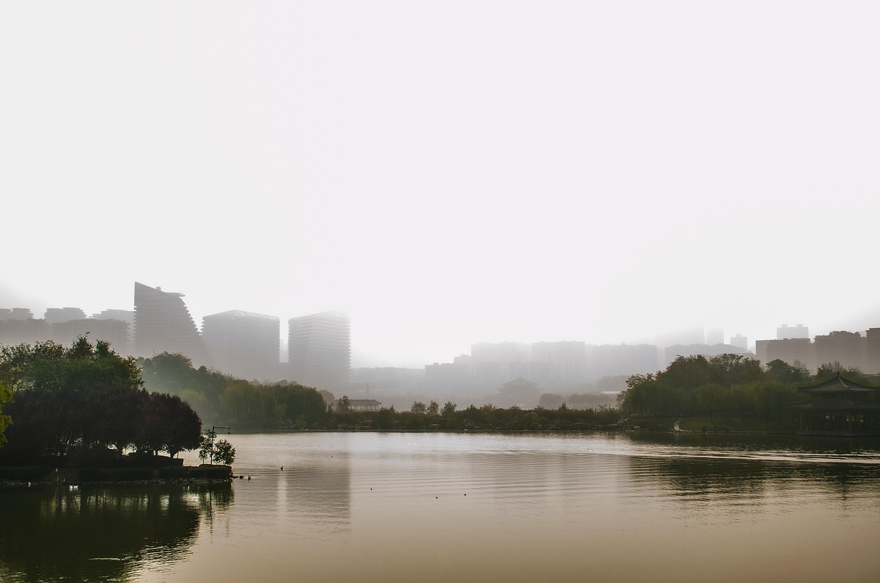 lake haze nature buildings skyline xi'an qujiang water surface