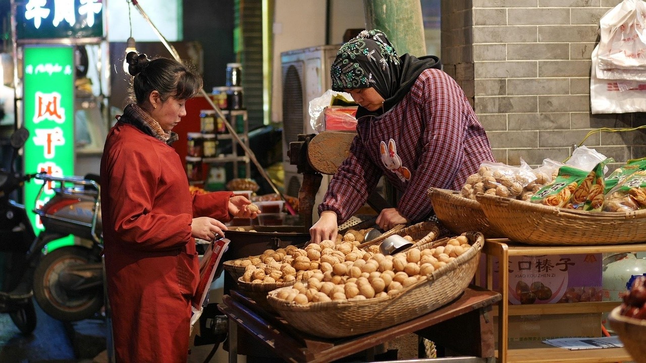 walnut hijab china xian seller buyer shopping market store shop people customer retail woman business purchase female food hijab china xian