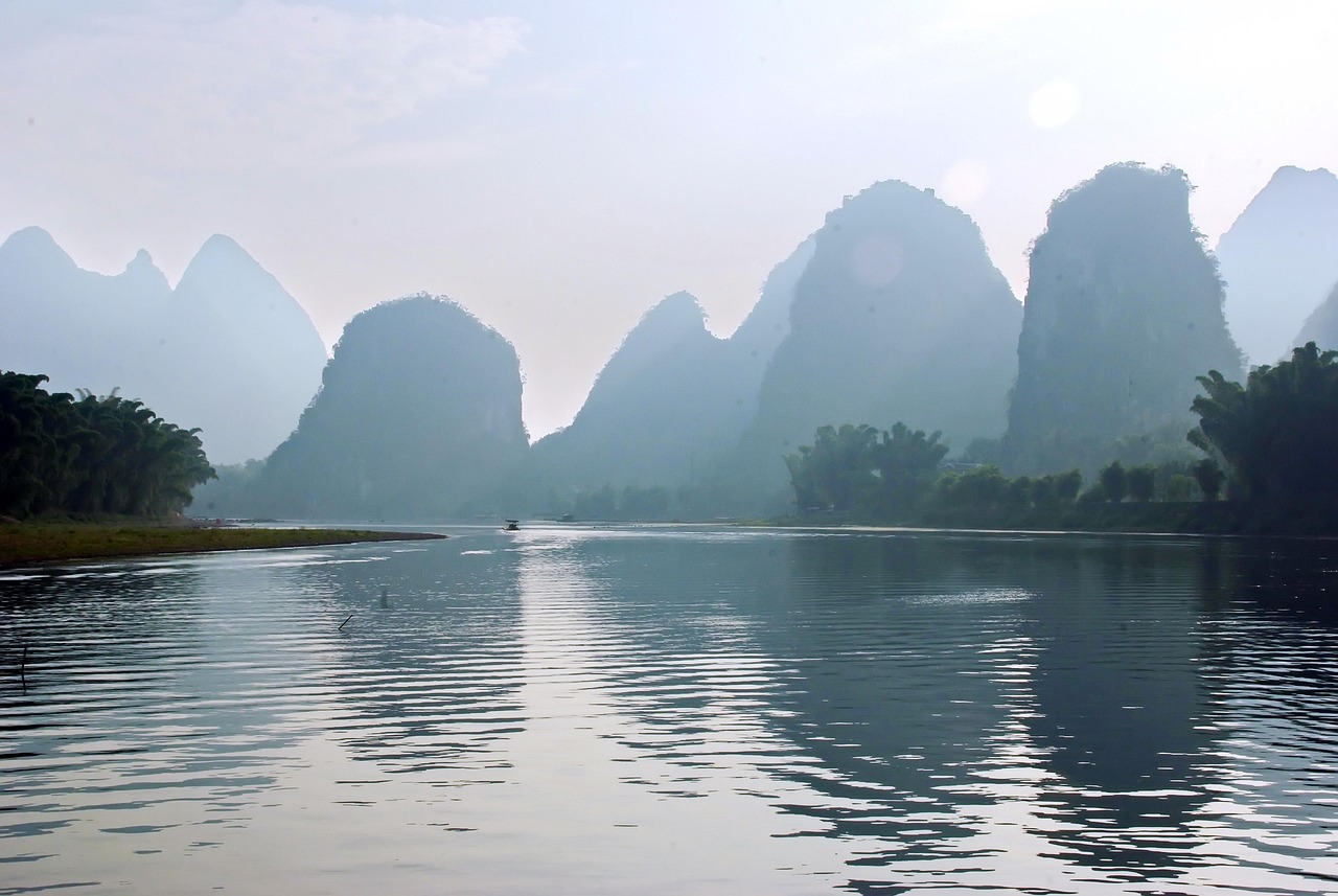 china  yangshuo  nimbuses  clouds  mist  li river  fishermen  body of water  travel  panoramic  mountain  nature  fading  reflection  reflections  china  china 
