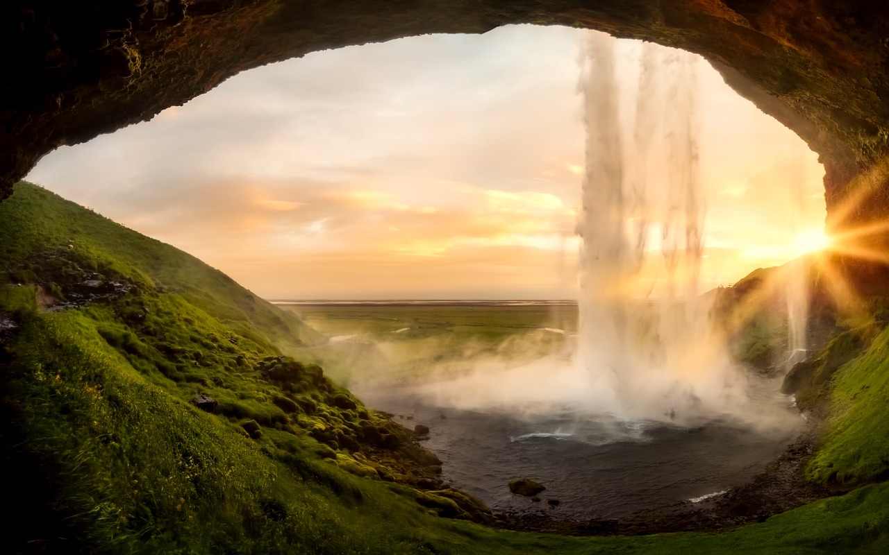 iceland waterfall seljalandsfoss stream nature water falls landmark attractions arch landscape sunset sunrise cavern cave portal