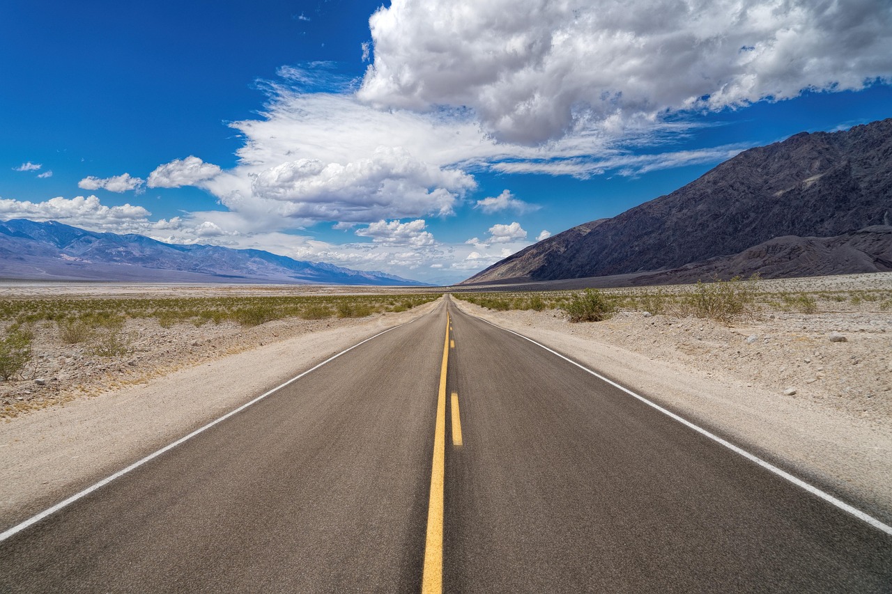 death valley road landscape desert nature dry panorama away movement travel clouds sky mountains road road road road road