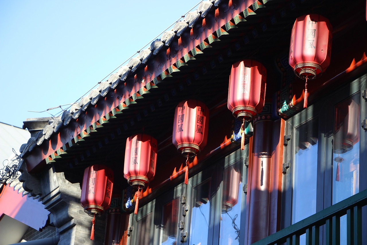 building building with ancient style red lanterns roof alley near qianmen street beijing china