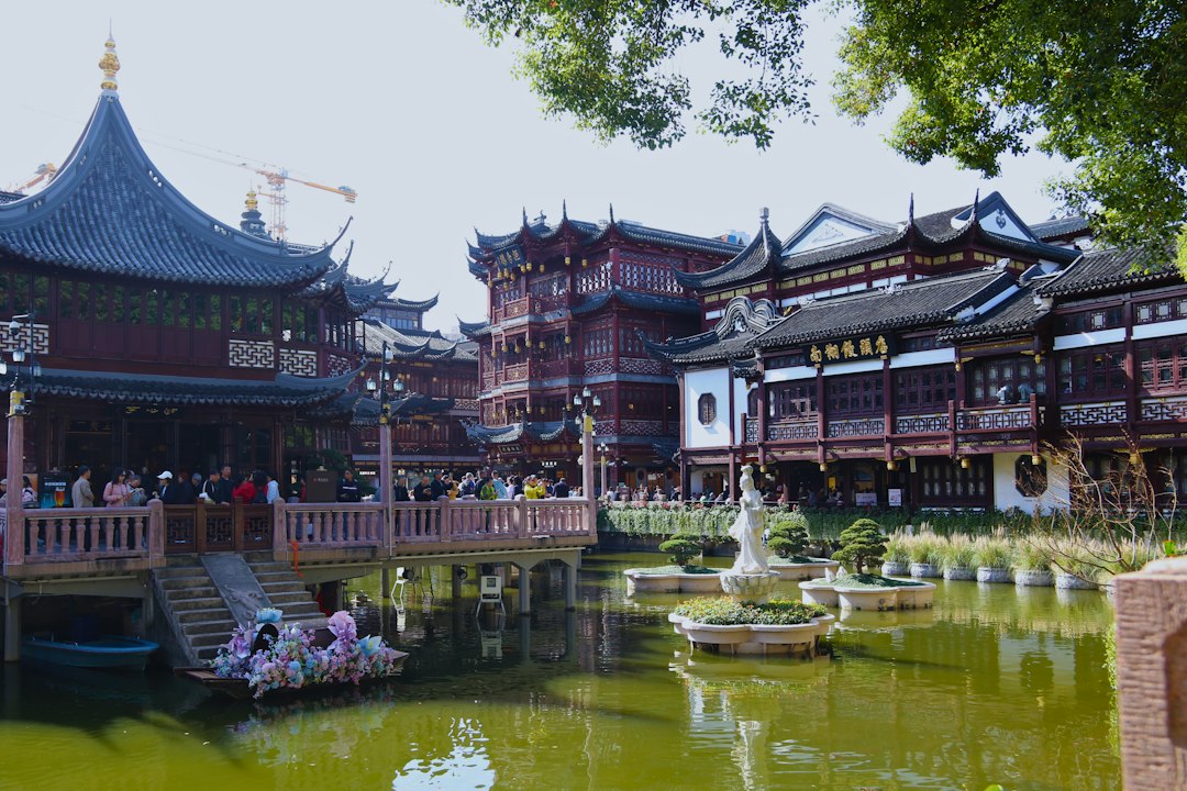 Traditional chinese architecture with a pond and garden