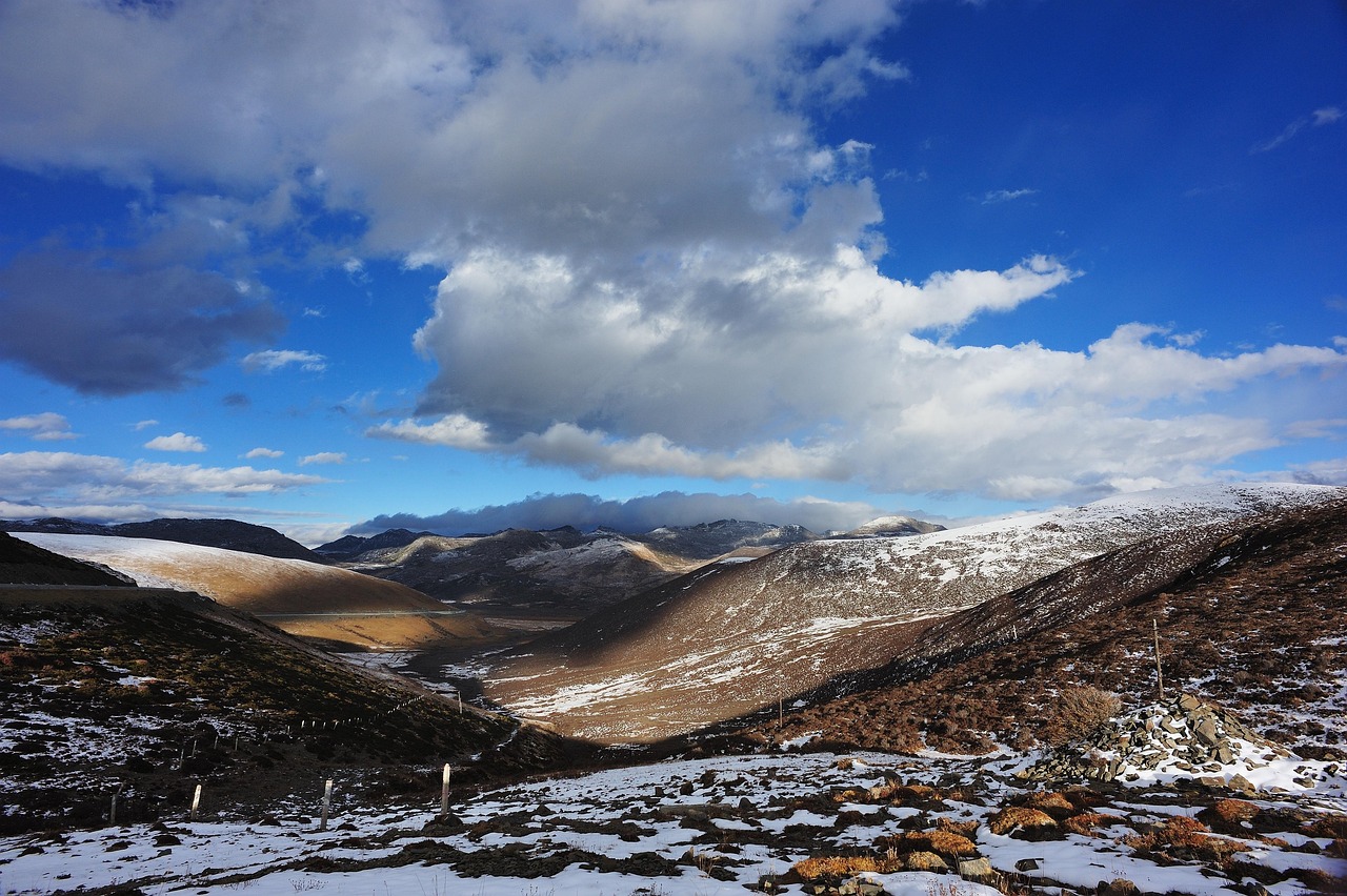 wilderness snow mountain cold meadow nature landscape mountain range the scenery rural area natural shangri-la sky clouds mountains rocks sunshi