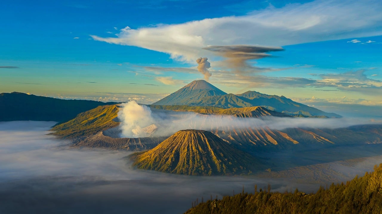 mountain  volcano  cloud  sunset  sunrise  landscape  fog  exploration  nature  panorama  national park  tourist destination  view  crater  bromo  semeru  blue 